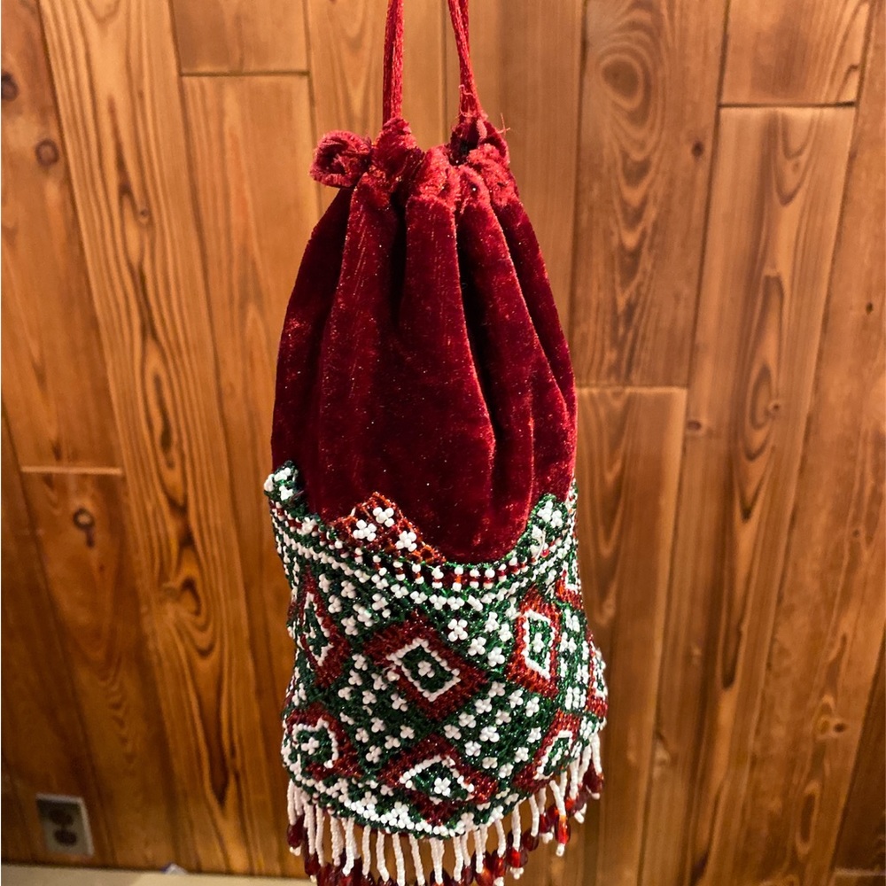 Royal Elegance: Handmade pearl art and velvet potli bag
